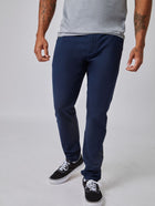 Joe is 6', 180LBS and wears a size 32x30 # Stretch Tech Pant in Navy | Fresh Clean Threads
