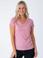 Maddy is 5'8", size 4 and wears a size S # Women's Chalk Pink V-Neck Tee | Fresh Clean Threads