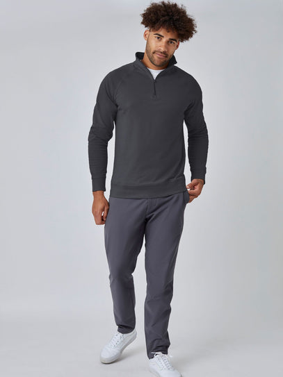 Joe is 6', 180LBS and wears a size L # Vintage Black Quarter Zip | Model Studio Image Full Body Angle | Fresh Clean Threads