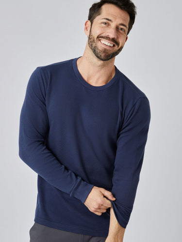 Patrick is 5'10", 163LBS and wears a size M # Navy Thermal Long Sleeve Crew Studio Image Model Size Medium | Fresh Clean Threads