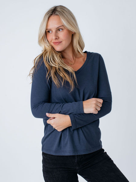 Maddy is 5'8", size 4 and wears a size S # Women's Odyssey Blue Long Sleeve with V-Neck | Fresh Clean Threads