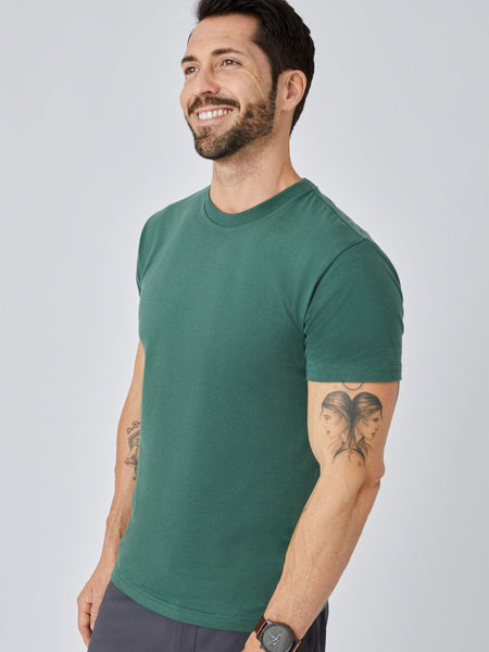 Patrick is 5'10", 163LBS and wears a size M # Alpine Green Crew Neck T-shirt | Studio Model | Regular and Tall Lengths | Fresh Clean Threads