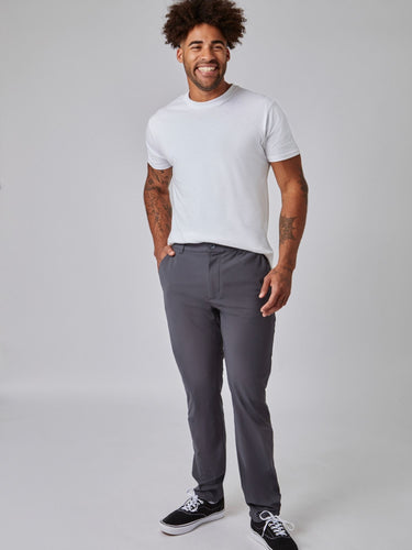 Joe is 6', 180LBS and wears a size 32x30 # Stretch Tech Pant Monochrome Black and Graphite 2-Pack | Fresh Clean Threads