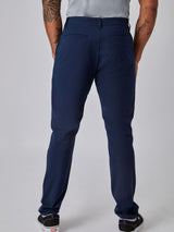 Joe is 6', 180LBS and wears a size 32x30 # Men's Tech Pant in Navy | Fresh Clean Threads