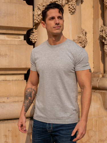 Tyler is 5'11, 175lbs and wears a size M # Heather Grey Crew Neck | Fresh Clean Threads Canada