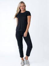 Maddy is 5'8", size 4 and wears a size S # Women's Black Crew Neck Tee | Basics | Shop Sizes: XS-3X