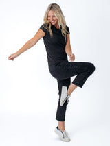 Maddy is 5'8", size 4 and wears a size S # Women's Basic Tees | Black Crew Neck | Fresh Clean Thread