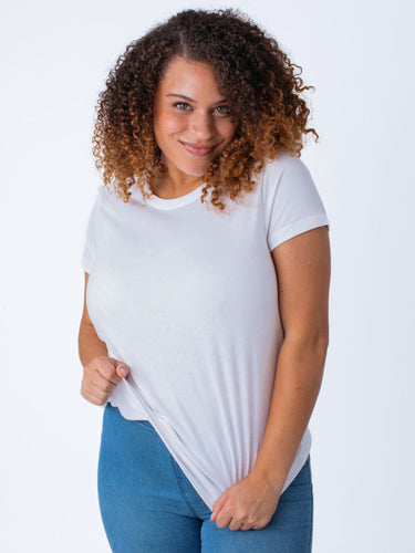Micah is 5'9, size 10 and wears a size L # Women's White Crew Neck T-shirt Basics | Fresh Clean Threads